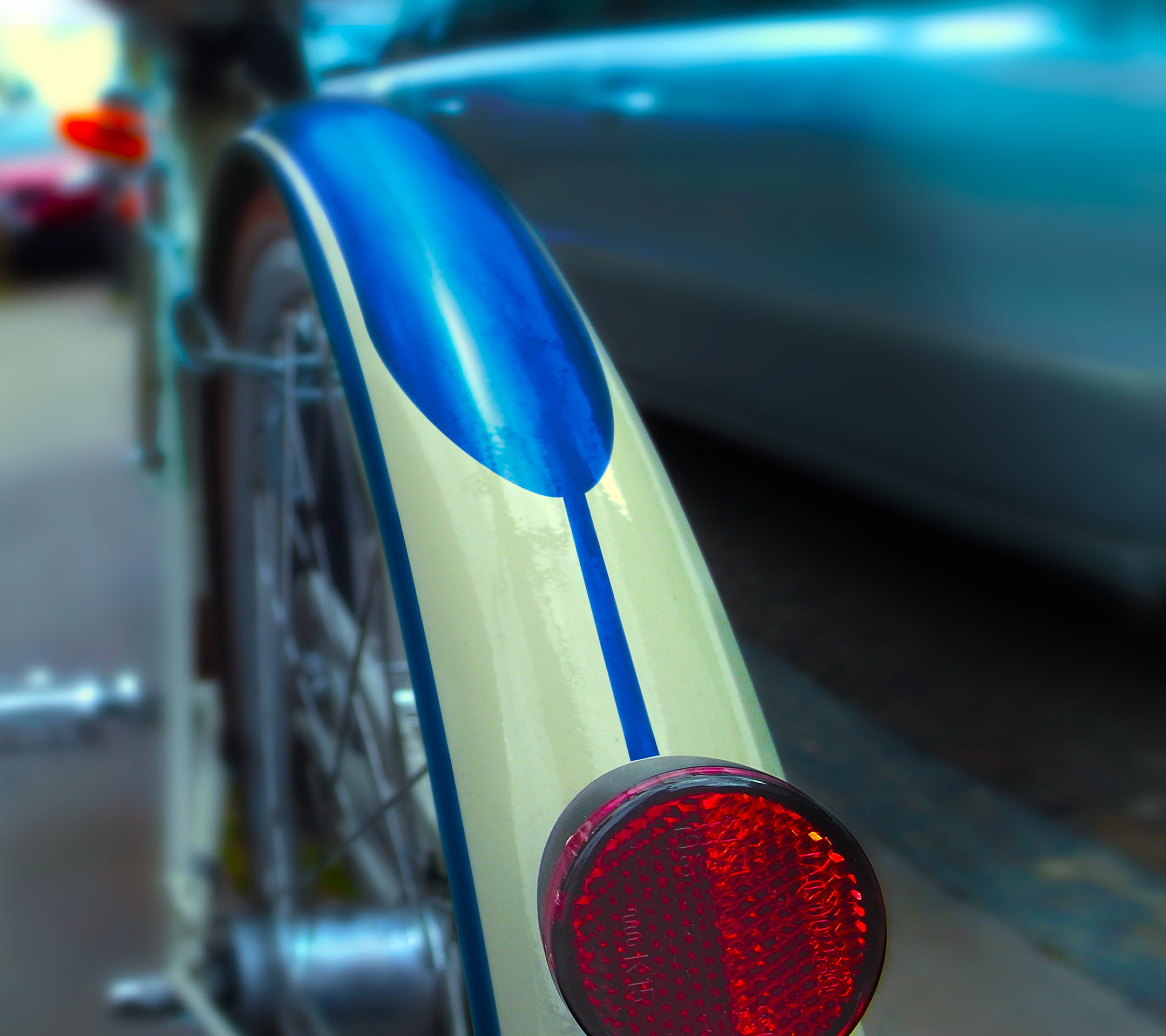 Moto X Official Stock HD Wallpaper of Backside of Cycle beside car