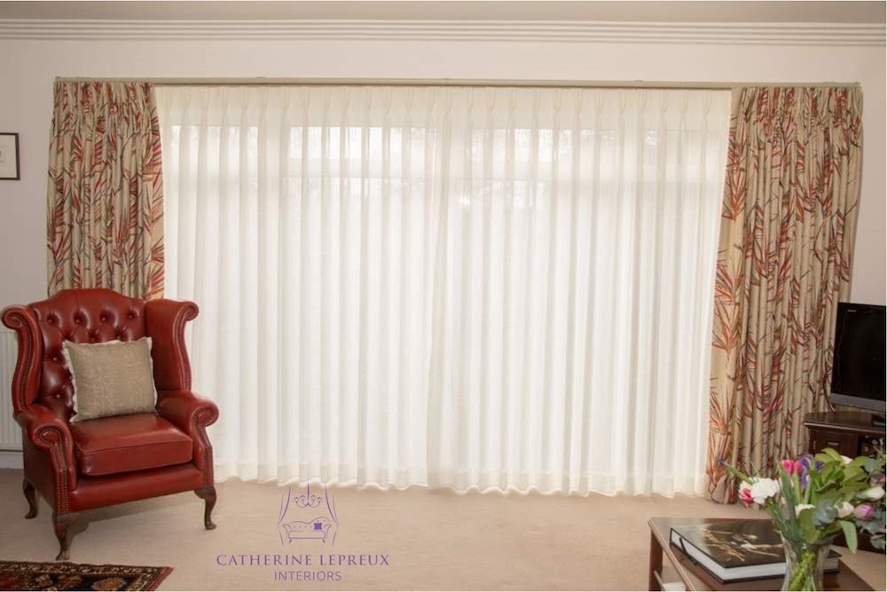 Neutral red living room curtains  Catherine Lepreux Interiors