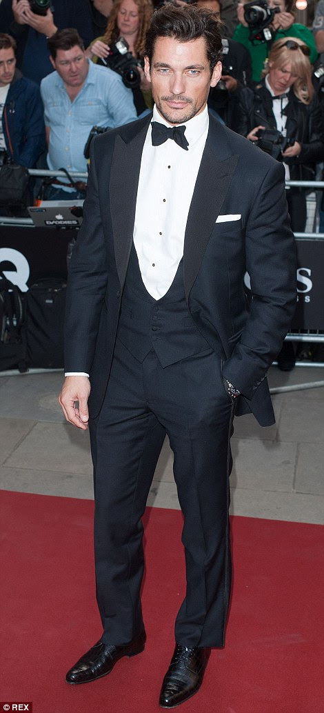 Suits you sir: Gerard Butler and David Gandy lead the dapper gents arriving at the GQ Awards on Tuesday night