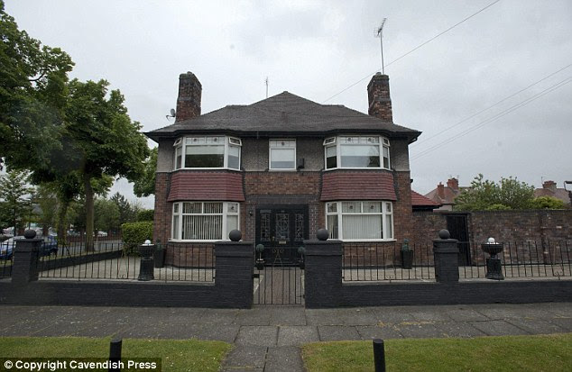 Unremarkable: The detached home in Mossley Hill, Liverpool, from where the Fitzgibbon family built up a crime empire they thought was 'untouchable'