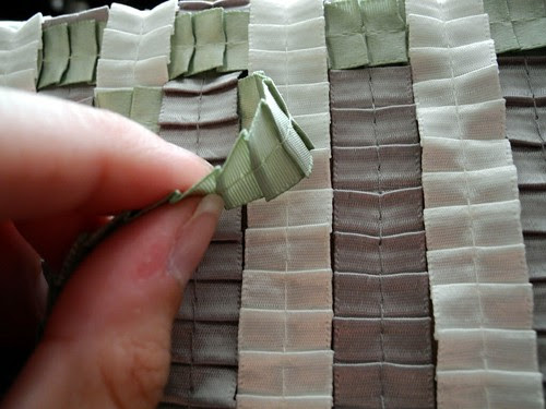 Weave the cross strips into the adhered strips