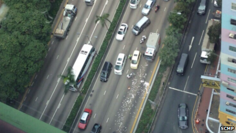 A shot from above the road in the Wan Chai district of Hong Kong, where the money spilled on to the street - 24 December 2014