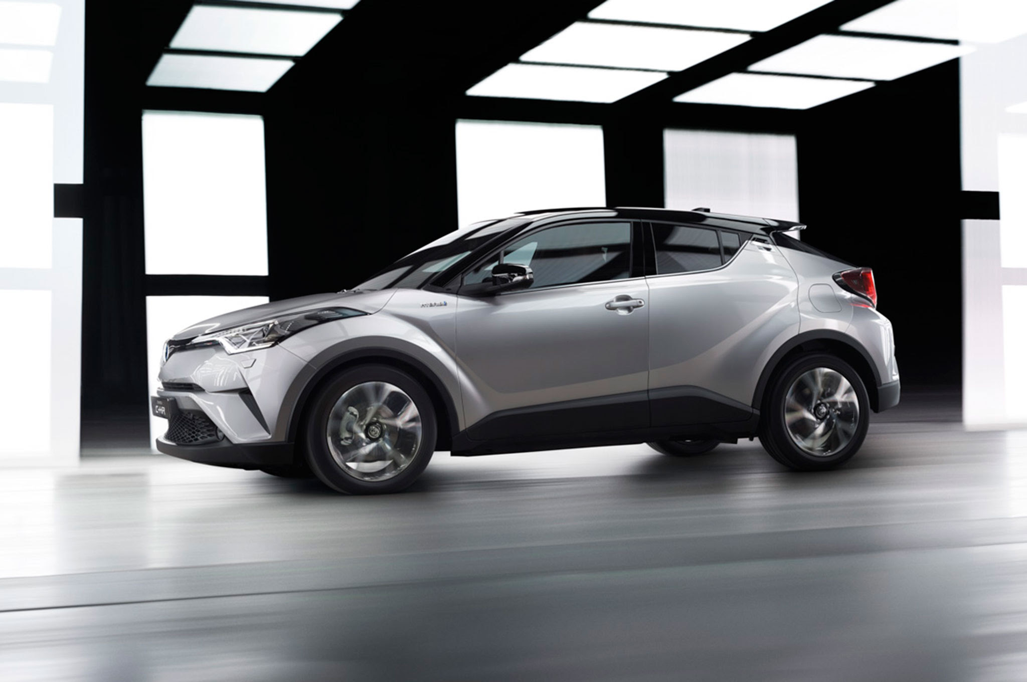 2016 Toyota C HR side profile in motion