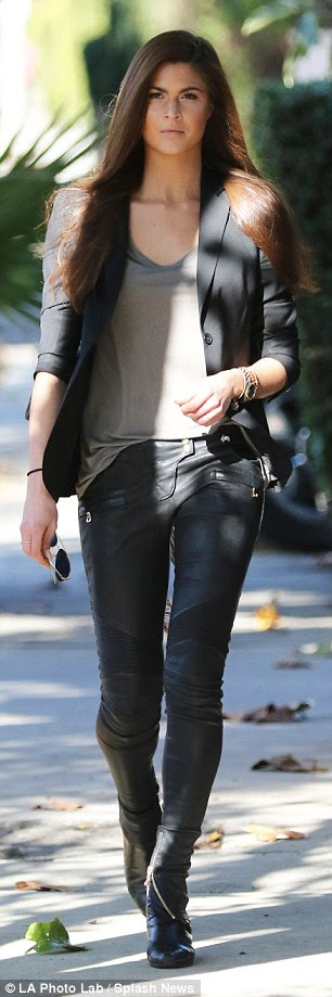 Lovely in leather: Sandberg showed off her svelte physique in skintight black leather pants
