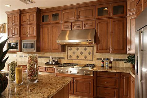 Grime and grease don't stand a chance with these tips for cleaning wood cabinets in the kitchen or bathroom. Cabinetry by Karman | USA | Kitchens and Baths manufacturer