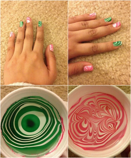 Festive Water Marbling - 20 Fantastic DIY Christmas Nail Art Designs That Are Borderline Genius