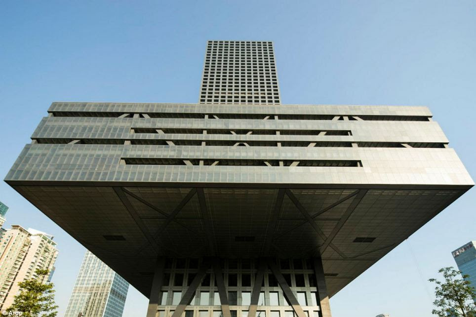 The 738ft (255metre) high tower of the Shenzhen Stock Exchange in China supports a large three-storey podium 118ft (36metre) above ground level. A textured all-glass facade enables the building to sparkle and change appearance according to the lighting conditions