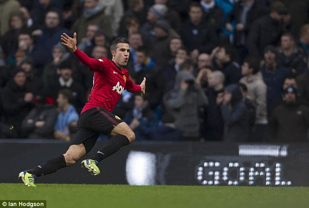 Robin van Persie celebrates scoring a last-minute winner at Manchester City in December 2012. Manchester United's 3-2 victory at the Etihad Stadium is their only triumph in the last six Manchester derbies