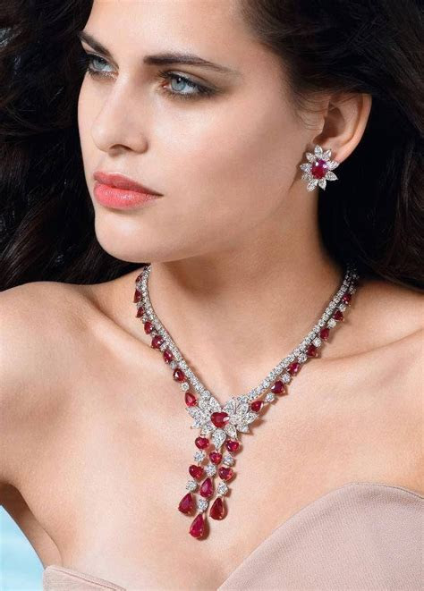 The modern design combines a 1/4 carat total weight of white and enhanced blue diamonds to create a piece . Extraordinary Red Ruby Jewelry