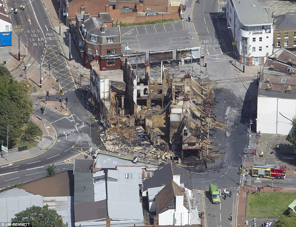 Destroyed: An aerial shot shows the extent of the damage to the Reeves building from the fire last night 