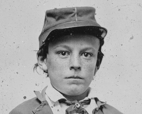 http://dotcw.com/wp-content/uploads/2012/08/Unidentified-young-soldier-in-Confederate-infantry-uniform-possibly-drummer-boy.jpg