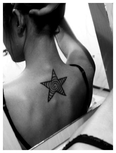 Tribal and star tattoo on lower back. Tribal and star tattoo on lower back. Tribal and star tattoo on lower back. Tribal and star tattoo on lower back.