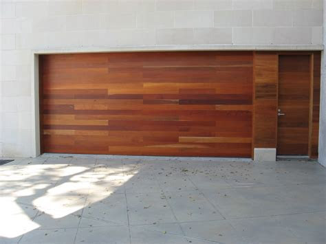 The average garage door costs $700 with a typical range between $350 and $1,100. Custom Wood Doors Houston, TX | Overhead Door Company of