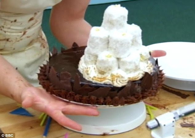 That's one impressive pudding: The heaven and hell cake was hard to master but John pulled it off without a hitch 