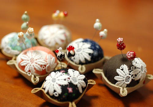 Leather bottom pincushions