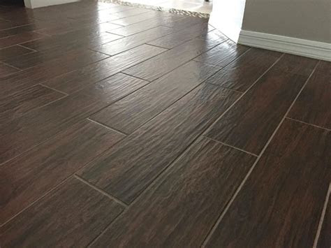 Tiles make spaces like bathrooms and kitchens look polished and beautiful, but keeping those tiles polished and beautiful is one of those household chores that really requires some extra elbow grease. Adventures in Flooring - Our New Wood Look Tile | Wood