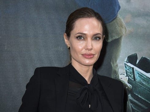 Angelina Jolie poses at the Paris premiere of 'World War Z' on June 3.
