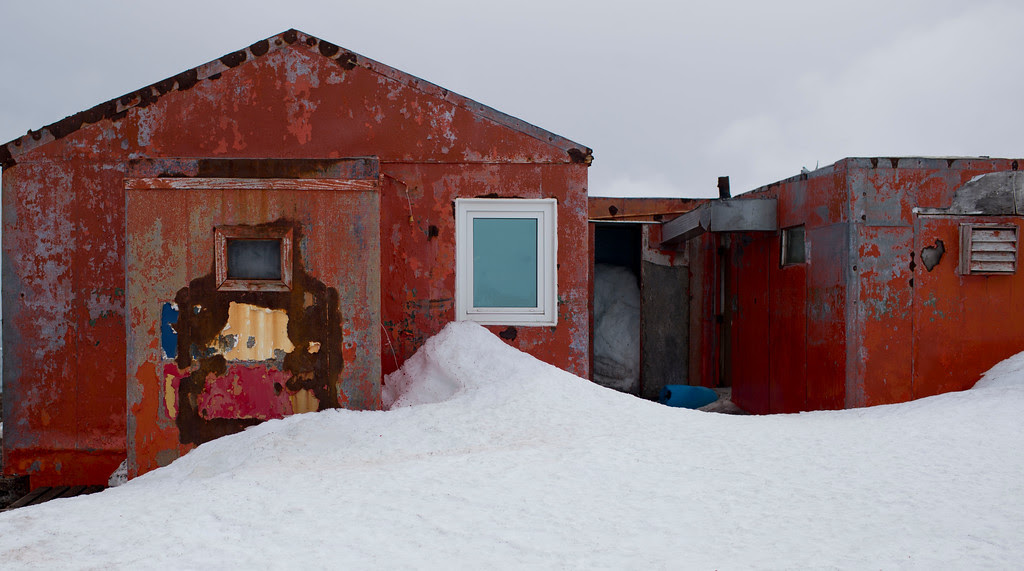 Description of . In this Jan. 24, 2015 photo, snow surrounds buildings used by Chile's scientists on Robert Island, part of the South Shetland Islands archipelago in Antarctica. Temperatures can range from above zero in the South Shetlands and Antarctic Peninsula to the unbearable frozen lands near the South Pole. (AP Photo/Natacha Pisarenko)