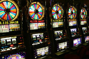 A row of "Wheel of Fortune" slot mac...