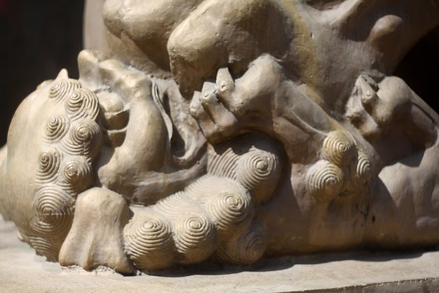 underdog (detail, portland chinatown gate)