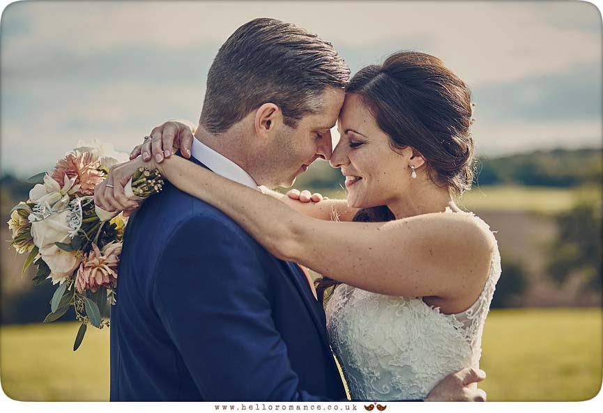 Bride and groom with heads together, Essex wedding photography - www.helloromance.co.uk