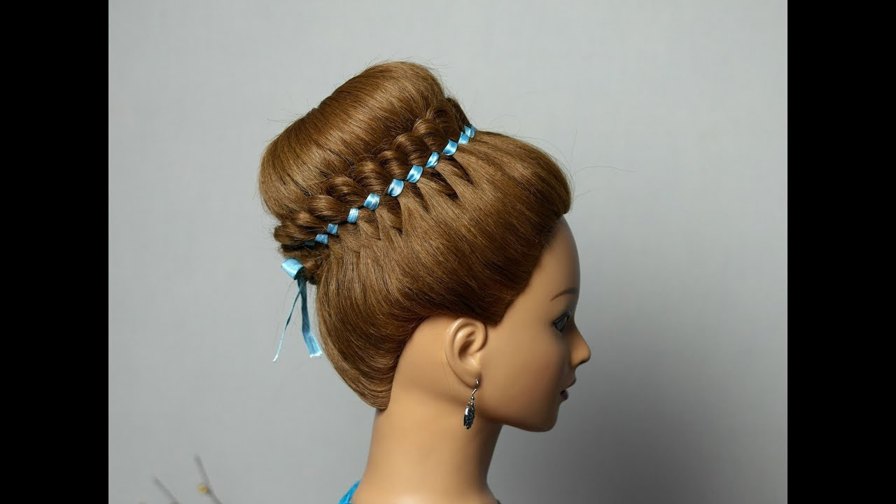 Braided hairstyle for long hair with 4 strand ribbon braid 