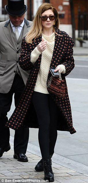Cheer up girls! Kimberley Walsh (left) was rushing to rehearsals, while bandmate Nicola Roberts was spotted outside a London hotel