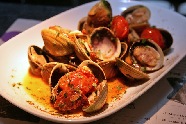 Littleneck clams from New Zealand, sauteed in butter, garlic, chorizo and white wine