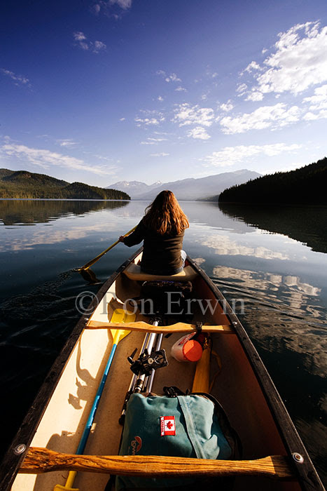 Paddling a canoe Paddling a canoe