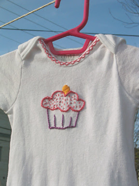 Cora's embroidered onesie