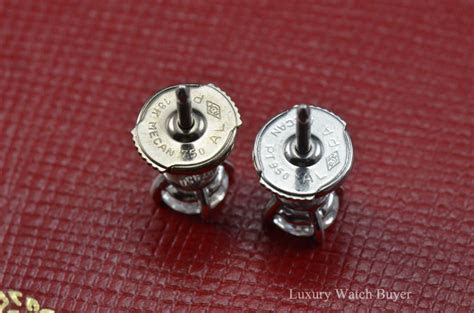 A four prong looks a bit more substantial. Beautiful Cartier Diamond Stud Platinum Earrings 0.87 CTW