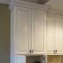 Kitchen Appliance Garage Cabinet - These are not cheap extras to include in your cabinetry design.