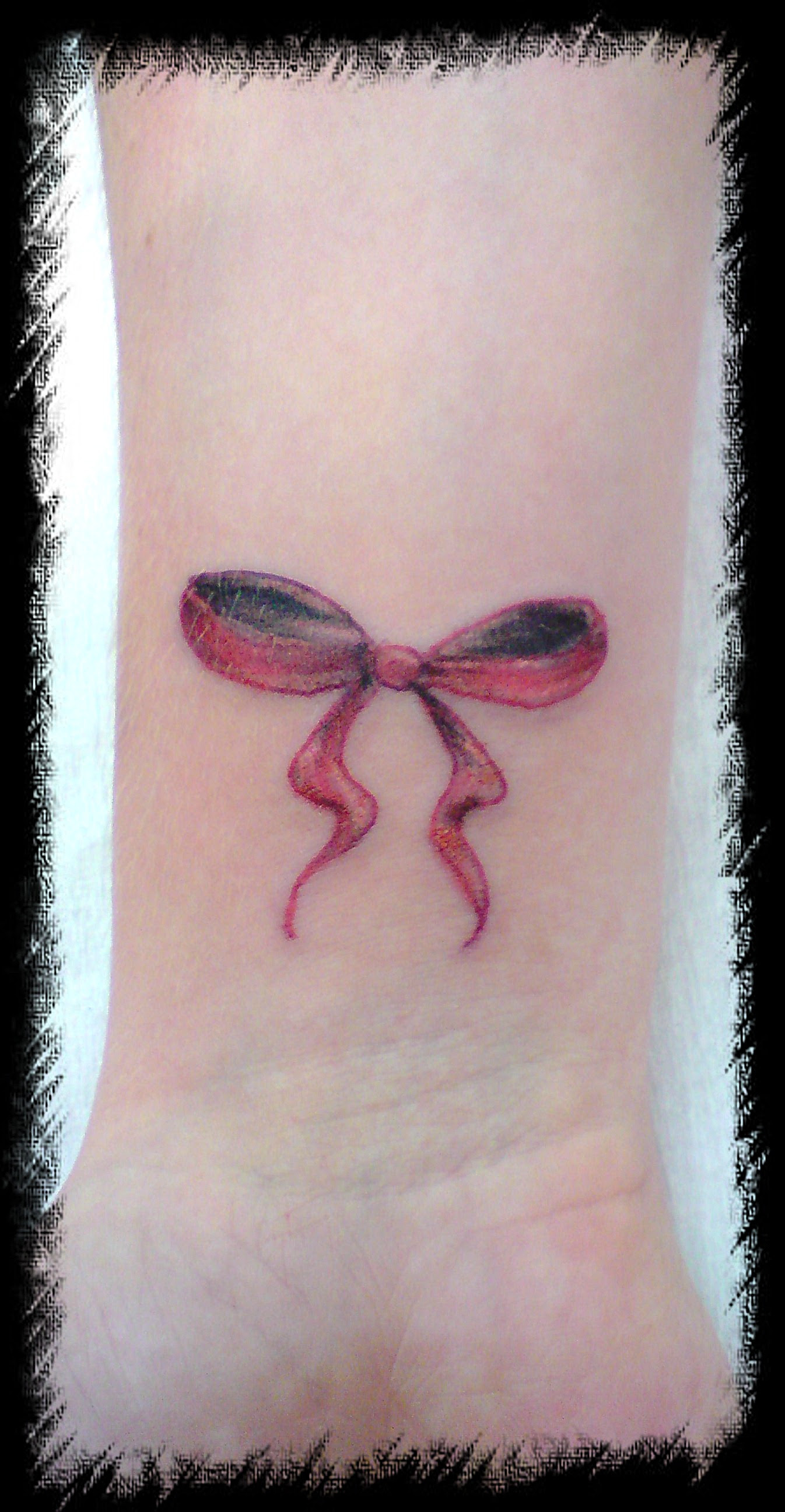 bow tattoos on wrist