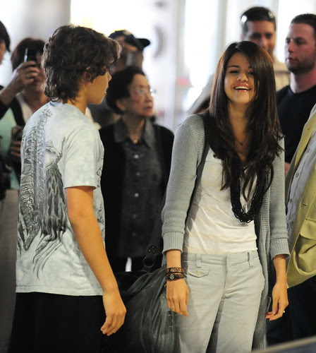 Selena Gomez And Co-Star Jake Austin Stay Close At LAX
