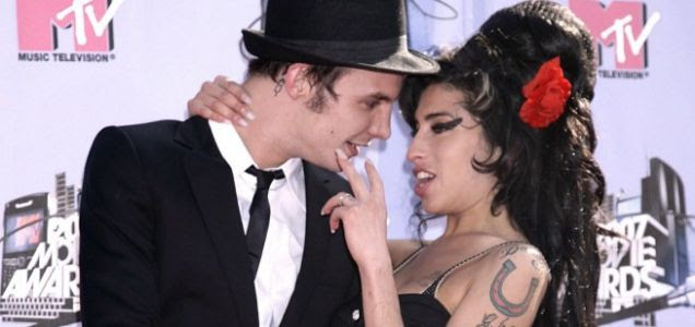 Amy and Blake Amy Winehouse and Blake: offending tattoo over Amy's heart is 