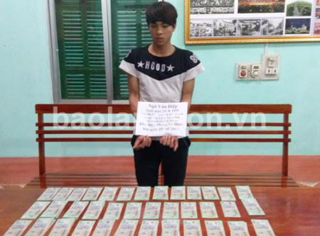 Đối tượng Điệp cùng tang vật nghi là tiền giả