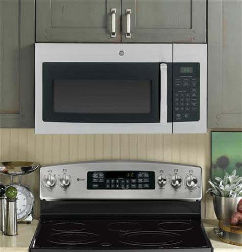 7 cu.ft two door direct cool ref energy efficient compressor consumes very minimal electricity only 100 watts hard refrigerator top reversible door light . GE JVM3160 Over-the-Range Microwave Oven with 1.6 cu. ft