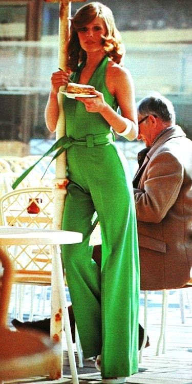 Model wearing an emerald green jumpsuit, 1972.