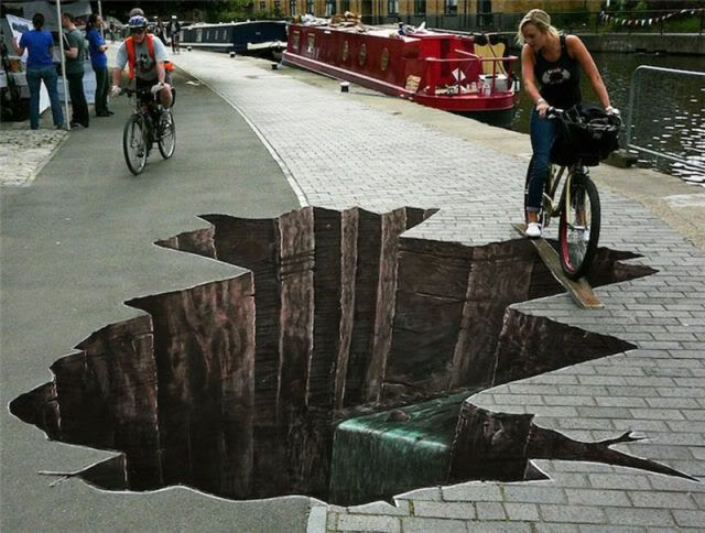http://i1127.photobucket.com/albums/l624/jexgill/the_best_2010_street_art_masterpiec-4.jpg