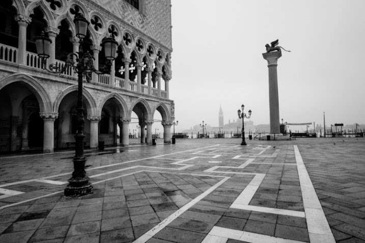 VENICE, ITALY - CIRCA MAY 2015: Piazza San Marco and Doge's Palace with San Giorgio Maggiore behind.