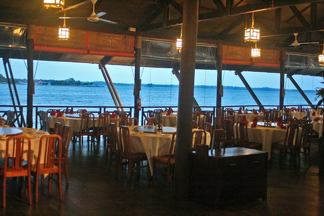 Cosy lighting and the cool seabreeze make for romantic dining