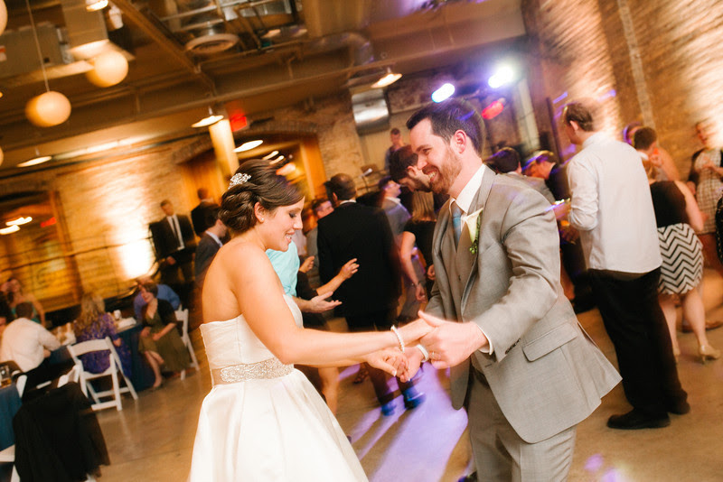 Wedding Reception photography at Prairie Street Brewhouse in Rockford, IL.  Wedding photographer – Ryan Davis Photography – Rockford, Illinois.
