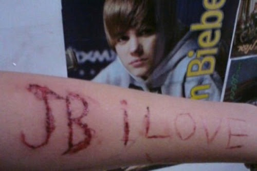 justin ieber cut into arm bieber cut out. justin ieber cut into arm