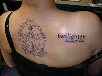 chest piece tattoo - "family is forever". "family is forever" in script,