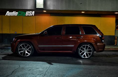 Our car experts choose every product we feature. 2008 Jeep SRT 8 on 22" Dodge Viper wheels Black windows