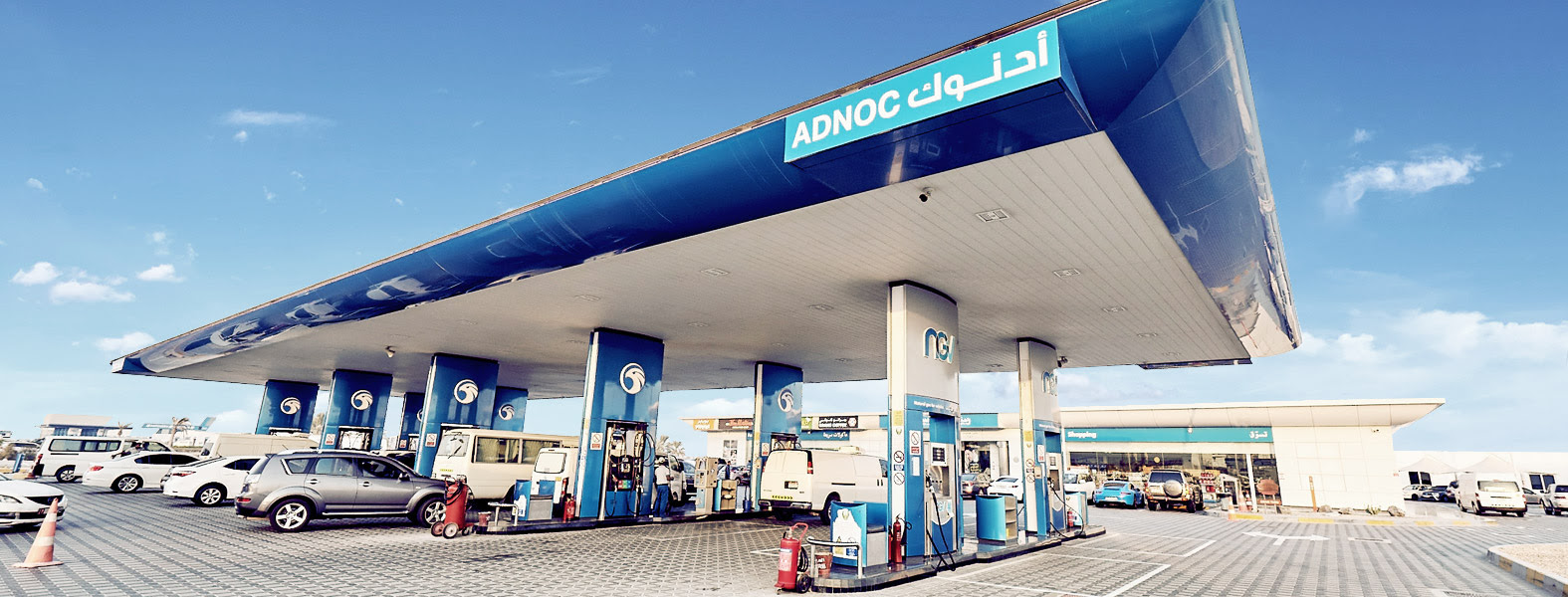 الخدمة المميزة أو الخدمة الذاتية خيارات التزود بالوقود في محطات أدنوك