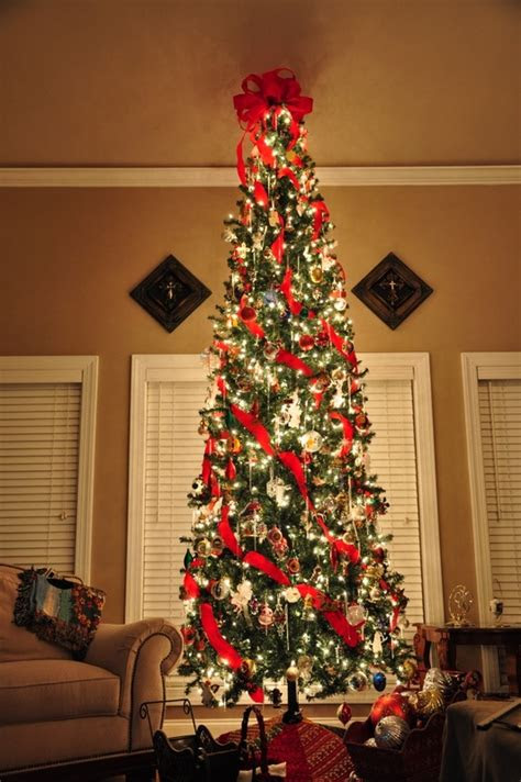 Looking to add a little holiday cheer to your bathroom? 25 Awesome Slim Christmas Tree Decorations Ideas - MagMent