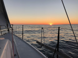J/111 sailing Chicago Mac Race- sunrise!