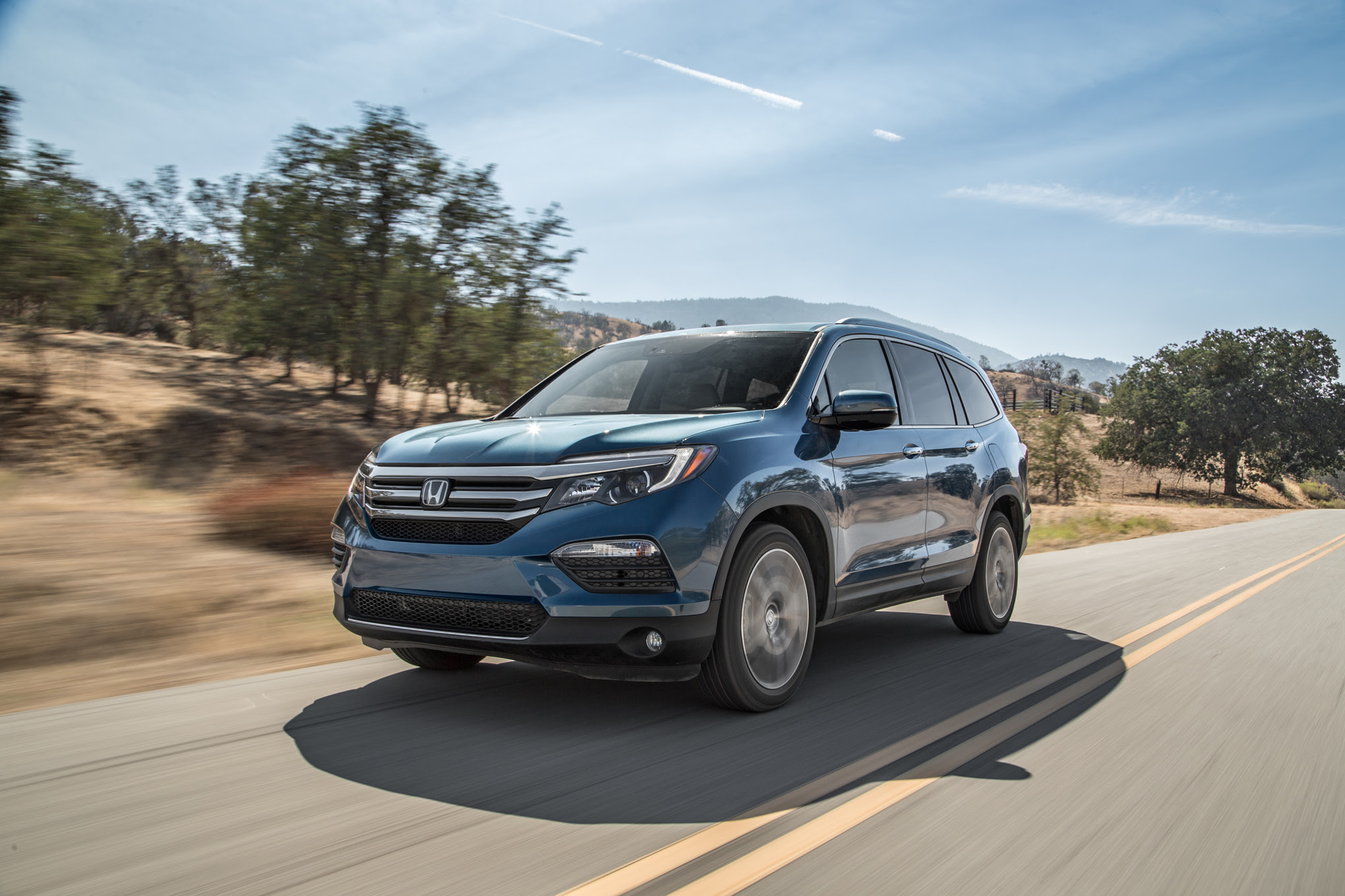 2016 Honda Pilot AWD Elite front three quarter in motion