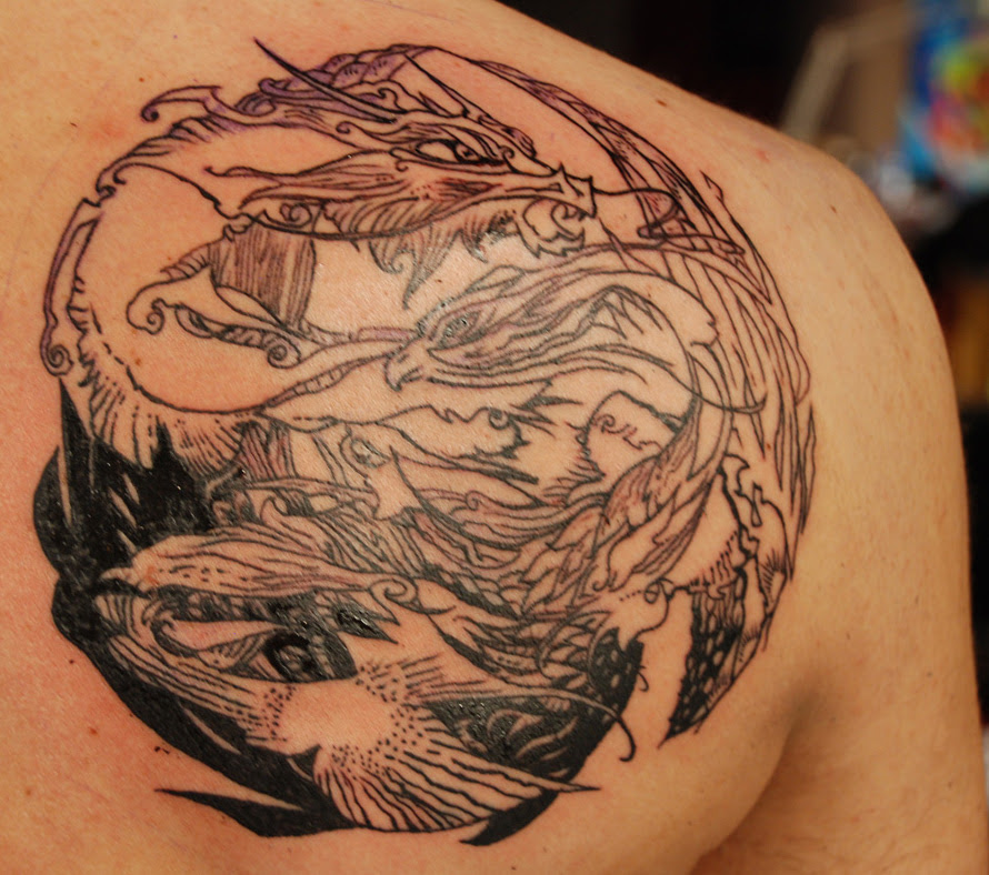 tattoos fenix. dragon phoenix tattoos.
